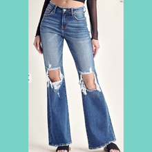 Risen Mid Distressed Flare Jeans