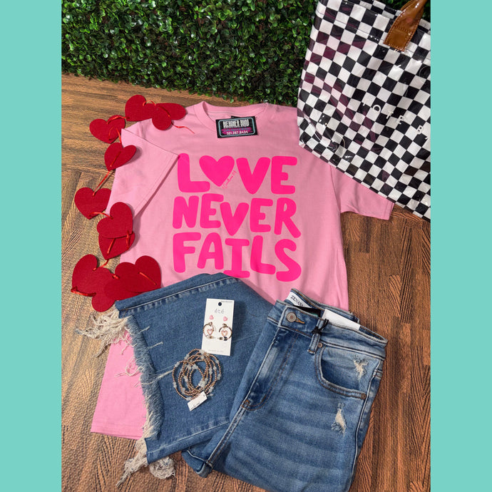 Love Never Fails Graphic Tee